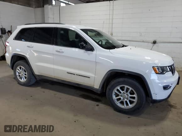 2019 Jeep Grand Cherokee Laredo E z VIN 1C4RJFAG9KC726931, wystawiony jako Copart lot #70262375 z przebiegiem 184 999 mil mil oraz Szkoda całkowita • Salvage title. Historia ofert i sprzedaży dostępna na DreamBid. Obrazek 4.