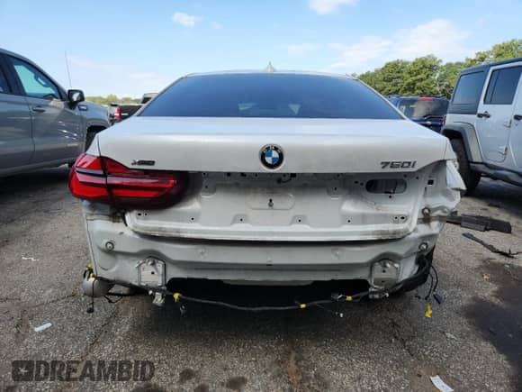 2019 BMW 7 Series 750i xDrive with VIN WBA7F2C5XKB239365, listed as a Copart auction lot 71458315 with 73,685 mi miles and Salvage title. Bid and sale history available at DreamBid. Image 6.