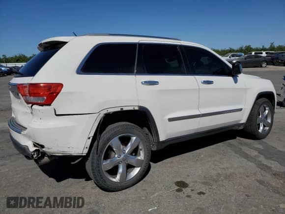2012 Jeep Grand Cherokee Overland с VIN 1C4RJECT5CC193062, выставлен на аукционе Copart как лот 59890265 с пробегом 170 537 миль миль и Списание • Salvage title. История ставок и продаж доступна на DreamBid. Изображение 3.