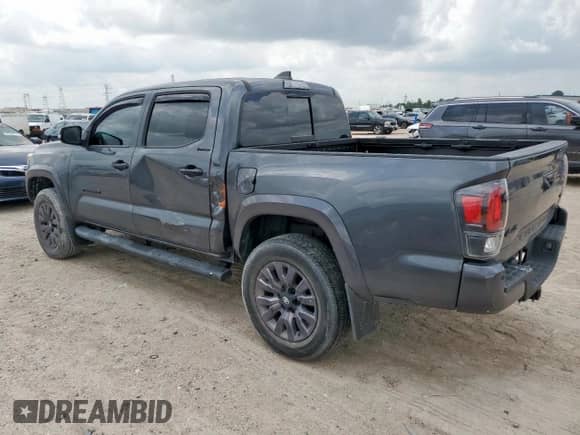 2021 Toyota Tacoma Limited with VIN 3TMGZ5AN6MM376619, listed as a Copart auction lot 60241765 with 25,739 mi miles and Salvage title. Bid and sale history available at DreamBid. Image 2.