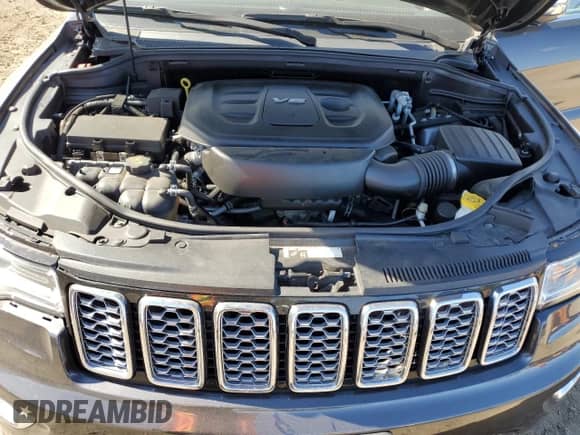 2017 Jeep Grand Cherokee Overland with VIN 1C4RJFCG3HC694208, listed as a Copart auction lot 71187645 with 67,455 mi miles and Salvage title. Bid and sale history available at DreamBid. Image 12.