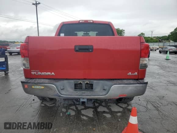 2013 Toyota Tundra с VIN 5TFDM5F15DX047007, выставлен на аукционе Copart как лот 55633835 с пробегом 112 604 миль миль и Списание • Salvage title. История ставок и продаж доступна на DreamBid. Изображение 6.