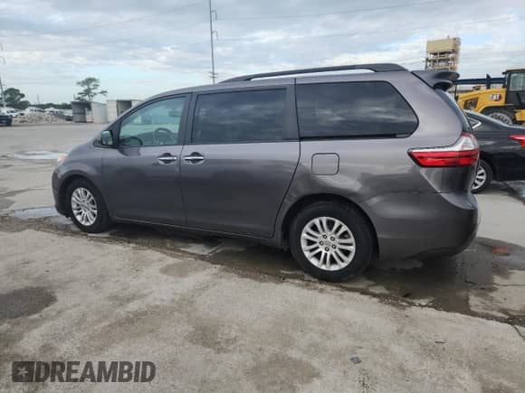 2015 Toyota Sienna XLE with VIN 5TDYK3DC0FS635339, listed as a Copart auction lot 84868955 with 181,129 mi miles and Salvage title. Bid and sale history available at DreamBid. Image 2.