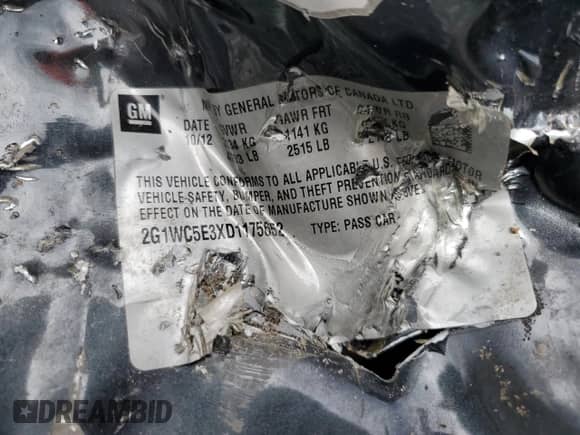 2013 Chevrolet Impala LTZ z VIN 2G1WC5E3XD1175652, wystawiony jako Copart lot #84699035 z przebiegiem 134 389 mil mil oraz Szkoda całkowita • Salvage title. Historia ofert i sprzedaży dostępna na DreamBid. Obrazek 13.