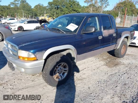 2004 Dodge Dakota SLT with VIN 1D7HG48N34S737294, listed as a IAAI auction lot 43498525 with 189,980 mi miles and . Bid and sale history available at DreamBid. Image 2.