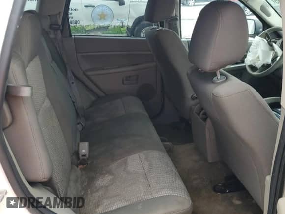 2008 Jeep Grand Cherokee Laredo с VIN 1J8GS48K98C244948, выставлен на аукционе Copart как лот 67619795 с пробегом Не указан миль и Списание • Salvage title. История ставок и продаж доступна на DreamBid. Изображение 11.