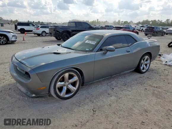 2012 Dodge Challenger R/T Plus z VIN 2C3CDYBTXCH294325, wystawiony jako Copart lot #81279755 z przebiegiem 160 740 mil mil oraz Szkoda całkowita • Salvage title. Historia ofert i sprzedaży dostępna na DreamBid. Obrazek 1.