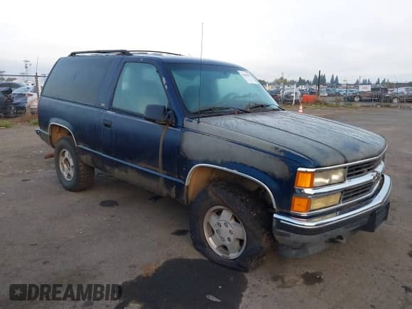 1994 Chevrolet Blazer z VIN 1GNEK18K5RJ300899, wystawiony jako IAAI lot #43484447 z przebiegiem 318 795 mil mil oraz . Historia ofert i sprzedaży dostępna na DreamBid. Obrazek 1.
