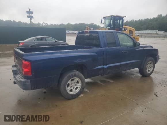 2005 Dodge Dakota ST z VIN 1D7HE22K35S329582, wystawiony jako Copart lot #65600065 z przebiegiem Nie podano mil oraz Szkoda całkowita • Salvage title. Historia ofert i sprzedaży dostępna na DreamBid. Obrazek 3.