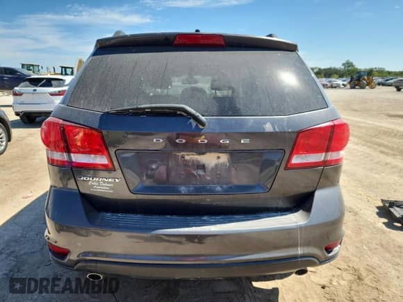 2019 Dodge Journey SE with VIN 3C4PDCBG2KT731551, listed as a Copart auction lot 82151025 with Not provided miles and Salvage title. Bid and sale history available at DreamBid. Image 6.