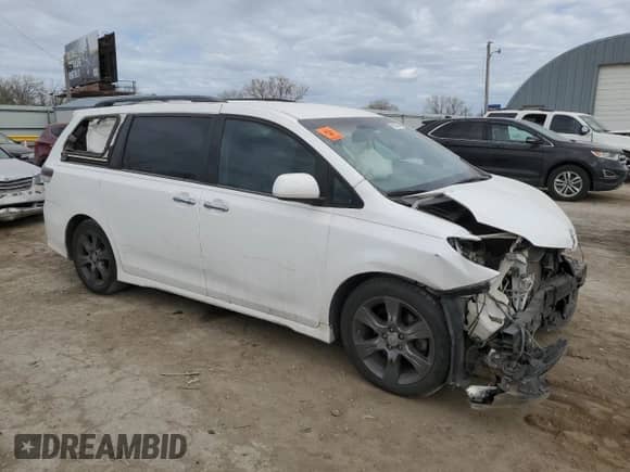 2015 Toyota Sienna SE with VIN 5TDXK3DC7FS628657, listed as a Copart auction lot 49920805 with 134,804 mi miles and Salvage title. Bid and sale history available at DreamBid. Image 4.