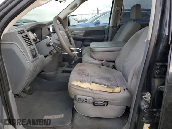 2007 Dodge 1500 SLT z VIN 3D7KR19D87G838900, wystawiony jako Copart lot #74038994 z przebiegiem 270 039 mil mil oraz Szkoda całkowita • Salvage title. Historia ofert i sprzedaży dostępna na DreamBid. Obrazek 7.