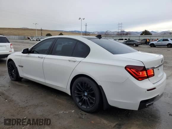 2012 BMW 7 Series 750i xDrive с VIN WBAKC6C5XCC396061, выставлен на аукционе Copart как лот 84295534 с пробегом 107 908 миль миль и Чистый • Clean title. История ставок и продаж доступна на DreamBid. Изображение 2.