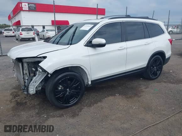 2021 Honda Pilot Special Edition z VIN 5FNYF5H29MB005354, wystawiony jako IAAI lot #42332612 z przebiegiem 86 434 mil mil oraz . Historia ofert i sprzedaży dostępna na DreamBid. Obrazek 20.