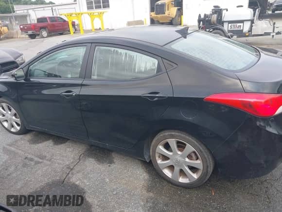 2011 Hyundai Elantra Limited z VIN KMHDH4AEXBU096139, wystawiony jako IAAI lot #42698468 z przebiegiem Nie podano mil oraz . Historia ofert i sprzedaży dostępna na DreamBid. Obrazek 14.