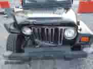 2001 Jeep Wrangler SE with VIN 1J4FA29P01P350847, listed as a IAAI auction lot 42821806 with 205,522 mi miles and . Bid and sale history available at DreamBid. Image 6.