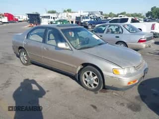 1994 Honda Accord EX with VIN JHMCD5655RC120856, listed as a IAAI auction lot 42477329 with 258,197 mi miles and . Bid and sale history available at DreamBid. Image 1.