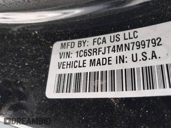 2021 Ram 1500 Laramie with VIN 1C6SRFJT4MN799792, listed as a IAAI auction lot 41838329 with 106,968 mi miles and . Bid and sale history available at DreamBid. Image 9.