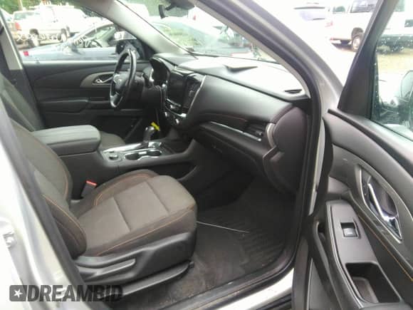 2019 Chevrolet Traverse LT Cloth z VIN 1GNEVGKW0KJ157212, wystawiony jako IAAI lot #42800696 z przebiegiem 84 825 mil mil oraz . Historia ofert i sprzedaży dostępna na DreamBid. Obrazek 5.
