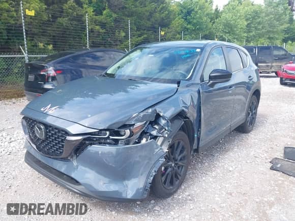 2025 Mazda CX-5 S Carbon Edition z VIN JM3KFBCM8S0646821, wystawiony jako IAAI lot #42610837 z przebiegiem Nie podano mil oraz . Historia ofert i sprzedaży dostępna na DreamBid. Obrazek 2.