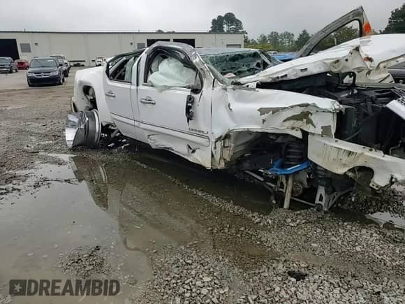 2010 GMC Sierra 1500 Denali z VIN 3GTRKXE29AG122910, wystawiony jako Copart lot #72068604 z przebiegiem 112 571 mil mil oraz Szkoda całkowita • Salvage title. Historia ofert i sprzedaży dostępna na DreamBid. Obrazek 11.