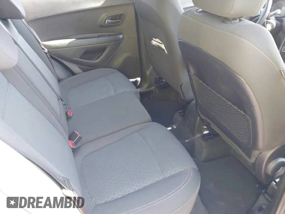 2020 Chevrolet Trax LS with VIN 3GNCJKSB9LL156735, listed as a IAAI auction lot 42947571 with 26,986 mi miles and . Bid and sale history available at DreamBid. Image 8.