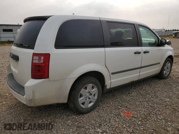 2009 Dodge Grand Caravan with VIN 2D8HN11E79R682979, listed as a Copart auction lot 71230285 with 49,442 mi miles and Salvage title. Bid and sale history available at DreamBid. Image 3.
