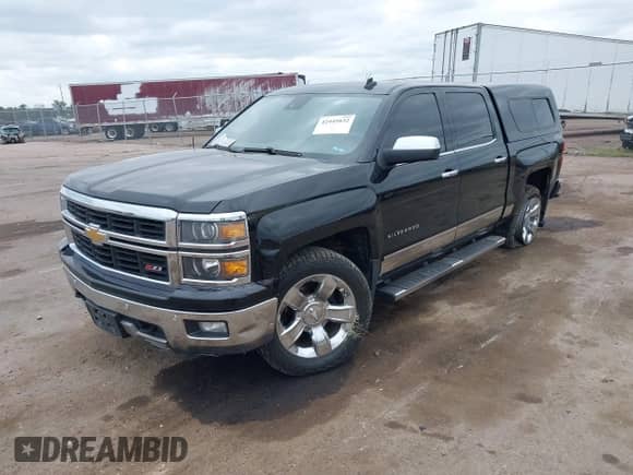 2014 Chevrolet Silverado 1500 LTZ with VIN 3GCUKSEC5EG301747, listed as a IAAI auction lot 42445832 with 169,483 mi miles and . Bid and sale history available at DreamBid. Image 2.