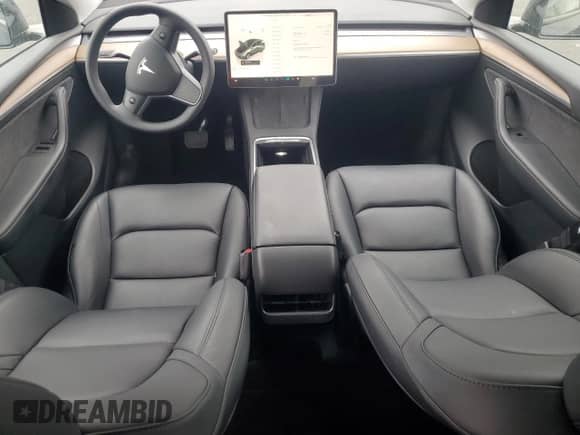 2023 Tesla Model Y Long Range z VIN 7SAYGDEE2PF828057, wystawiony jako Copart lot #68909315 z przebiegiem 22 317 mil mil oraz Szkoda całkowita • Salvage title. Historia ofert i sprzedaży dostępna na DreamBid. Obrazek 8.