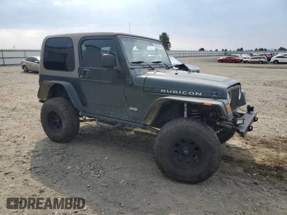 2003 Jeep Wrangler Rubicon с VIN 1J4FA69S43P327618, выставлен на аукционе Copart как лот 70574135 с пробегом 111 917 миль миль и Списание • Salvage title. История ставок и продаж доступна на DreamBid. Изображение 4.
