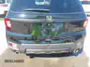 2023 Honda Passport TrailSport с VIN 5FNYF8H64PB033801, выставлен на аукционе IAAI как лот 43140933 с пробегом 38 095 миль миль и . История ставок и продаж доступна на DreamBid. Изображение 18.