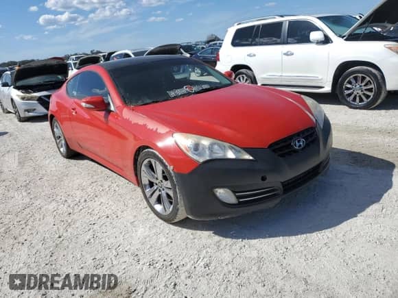 2011 Hyundai Genesis Coupe Track z VIN KMHHU6KHXBU052434, wystawiony jako Copart lot #77558364 z przebiegiem Nie podano mil oraz Szkoda całkowita • Salvage title. Historia ofert i sprzedaży dostępna na DreamBid. Obrazek 4.