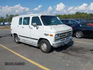 1994 Chevrolet Chevy Van with VIN 1GCEG25H7RF100277, listed as a IAAI auction lot 43242872 with 144,592 mi miles and . Bid and sale history available at DreamBid. Image 1.