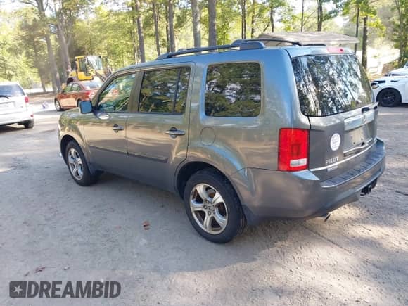 2013 Honda Pilot EX-L with VIN 5FNYF4H57DB010542, listed as a IAAI auction lot 43286663 with 140,708 mi miles and . Bid and sale history available at DreamBid. Image 3.