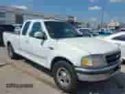 2003 Ford F-150 XL with VIN 1FTRX17203NA45592, listed as a IAAI auction lot 42952991 with Not provided miles and . Bid and sale history available at DreamBid. Image 1.