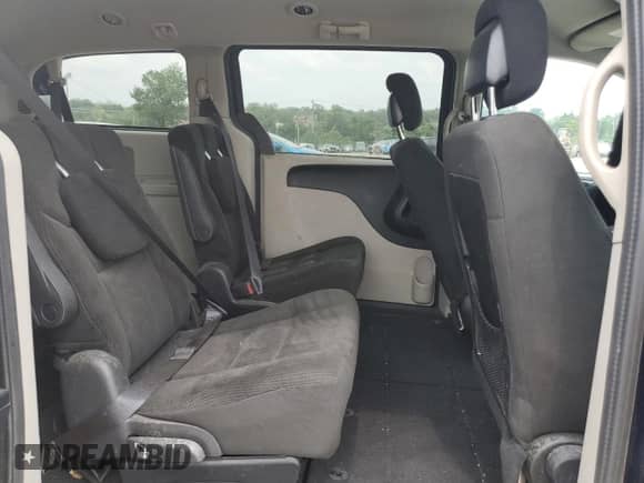 2016 Dodge Grand Caravan American Value with VIN 2C4RDGBG0GR122324, listed as a Copart auction lot 68100645 with 161,495 mi miles and Clean title. Bid and sale history available at DreamBid. Image 11.