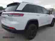 2025 Jeep Grand Cherokee Altitude with VIN 1C4RJGAG0SC266712, listed as a IAAI auction lot 42792449 with 5,453 mi miles and . Bid and sale history available at DreamBid. Image 4.