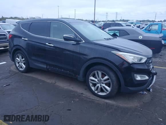 2013 Hyundai Santa Fe Sport with VIN 5XYZW3LA1DG034265, listed as a Copart auction lot 82314195 with 189,865 mi miles and Clean title. Bid and sale history available at DreamBid. Image 4.