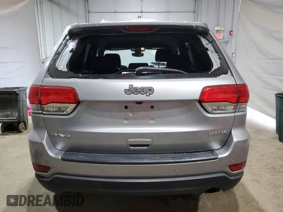 2018 Jeep Grand Cherokee Laredo E with VIN 1C4RJFAG6JC147524, listed as a Copart auction lot 66499715 with 91,554 mi miles and Salvage title. Bid and sale history available at DreamBid. Image 6.