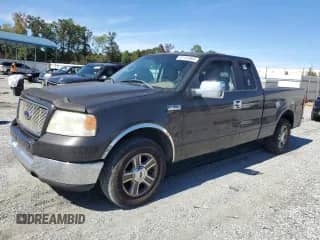 2005 Ford F-150 XLT with VIN 1FTPX12505NB05334, listed as a Copart auction lot 82191965 with 220,177 mi miles and Salvage title. Bid and sale history available at DreamBid. Image 1.
