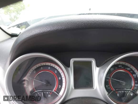 2012 Dodge Journey SE z VIN 3C4PDCAB9CT290198, wystawiony jako IAAI lot #42254160 z przebiegiem 91 000 mil mil oraz . Historia ofert i sprzedaży dostępna na DreamBid. Obrazek 7.