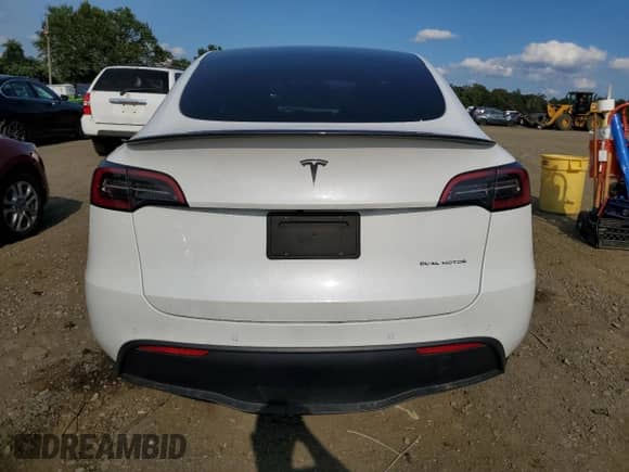 2022 Tesla Model Y Long Range с VIN 7SAYGDEEXNF536766, выставлен на аукционе Copart как лот 71866715 с пробегом 105 110 миль миль и Списание • Salvage title. История ставок и продаж доступна на DreamBid. Изображение 6.