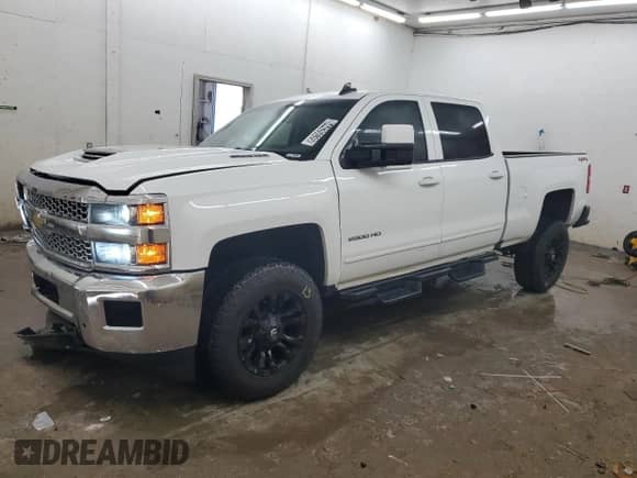2019 Chevrolet Silverado 2500HD LT с VIN 1GC1KSEY6KF227492, выставлен на аукционе Copart как лот 64435535 с пробегом 91 330 миль миль и Чистый • Clean title. История ставок и продаж доступна на DreamBid. Изображение 1.
