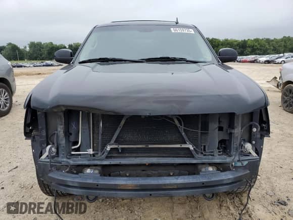 2009 Chevrolet Tahoe 2LT z VIN 1GNFK230X9R295068, wystawiony jako Copart lot #66159735 z przebiegiem 167 920 mil mil oraz Szkoda całkowita • Salvage title. Historia ofert i sprzedaży dostępna na DreamBid. Obrazek 5.