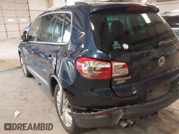 2014 Volkswagen Tiguan SEL with VIN WVGAV3AX8EW563008, listed as a IAAI auction lot 41356523 with 138,211 mi miles and . Bid and sale history available at DreamBid. Image 17.