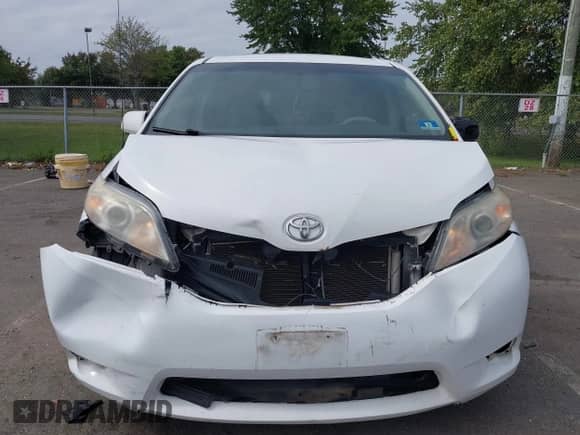 2013 Toyota Sienna LE AAS with VIN 5TDKK3DC3DS308565, listed as a IAAI auction lot 43281154 with 221,342 mi miles and . Bid and sale history available at DreamBid. Image 6.