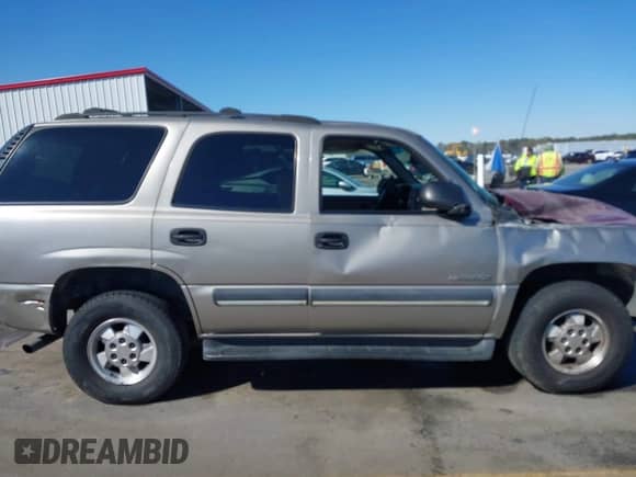 2003 Chevrolet Tahoe LS with VIN 1GNEC13V73J164409, listed as a IAAI auction lot 41835609 with 272,873 mi miles and . Bid and sale history available at DreamBid. Image 13.