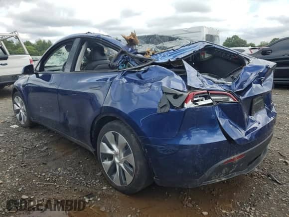 2020 Tesla Model Y Long Range with VIN 5YJYGDEE2LF015602, listed as a Copart auction lot 67719774 with Not provided miles and Salvage title. Bid and sale history available at DreamBid. Image 2.