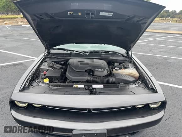 2021 Dodge Challenger SXT z VIN 2C3CDZAG2MH627290, wystawiony jako Copart lot #90298955 z przebiegiem 72 280 mil mil oraz Szkoda całkowita • Salvage title. Historia ofert i sprzedaży dostępna na DreamBid. Obrazek 7.