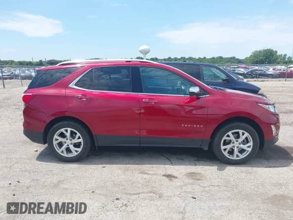 2020 Chevrolet Equinox Premier with VIN 2GNAXXEV2L6221454, listed as a IAAI auction lot 42843204 with 43,861 mi miles and . Bid and sale history available at DreamBid. Image 13.